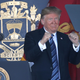 President Donald Trump gestures during a U.S. Naval Academy graduation ceremony at the Navy-Marine Corps Memorial Stadium on May 25, 2018, in Annapolis, Md.